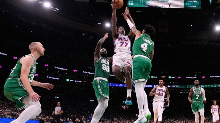Celtics show flashes, but 76ers claim season opener