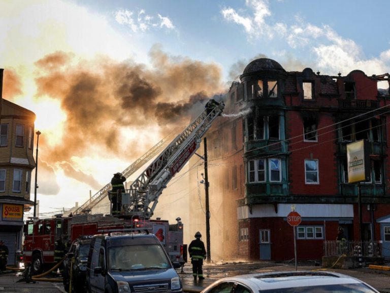 New Bedford woman dies days after rescue from burning home