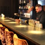 Boston’s hottest ticket? A bar seat for a lecture from a professor.