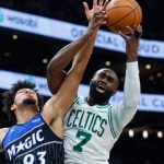 Brown, Celtics hold off late push by short-handed Magic in win
