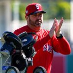 Jason Varitek is happy to be back with Red Sox on a new deal